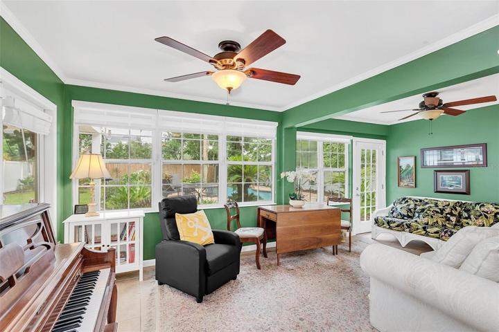 Florida room/Sunroom with walls of windows and natural light