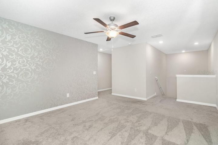 Head upstairs to discover the awesome loft/gameroom that awaits your creative touch. Use it as a media center, play area, or even a home gym – the possibilities are endless!