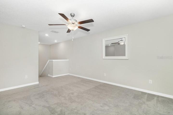 Head upstairs to discover the awesome loft/gameroom that awaits your creative touch. Use it as a media center, play area, or even a home gym – the possibilities are endless!