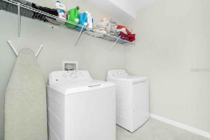 Inside Laundry Room with washer and dryer