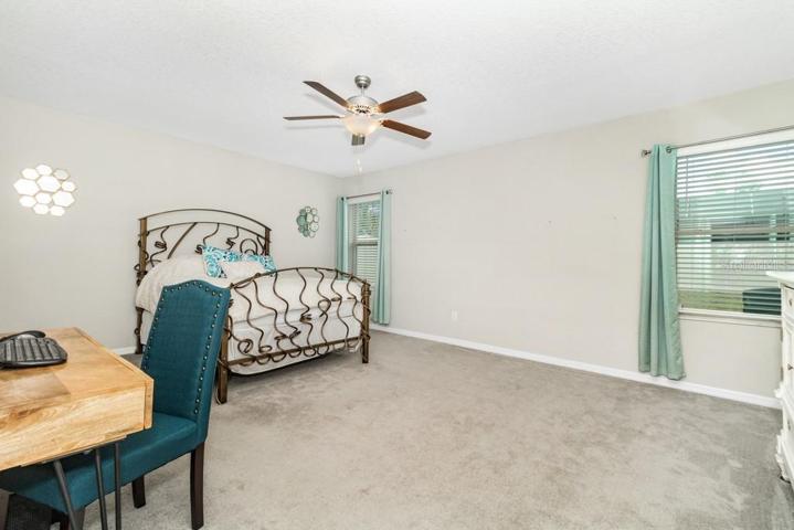 The master suite is also located on the first floor and is a true haven of tranquility, featuring a generously sized walk-in closet and an en-suite bathroom.