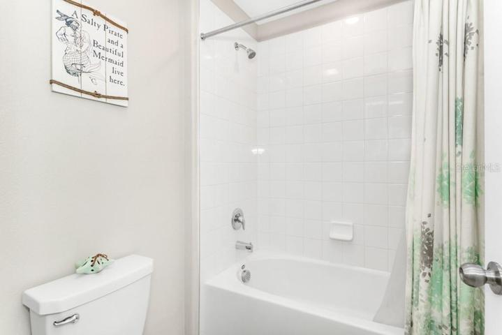 The full bathroom with tub and shower on this level ensures convenience for family and guests.