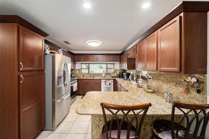 Renovated kitchen with granite countertop