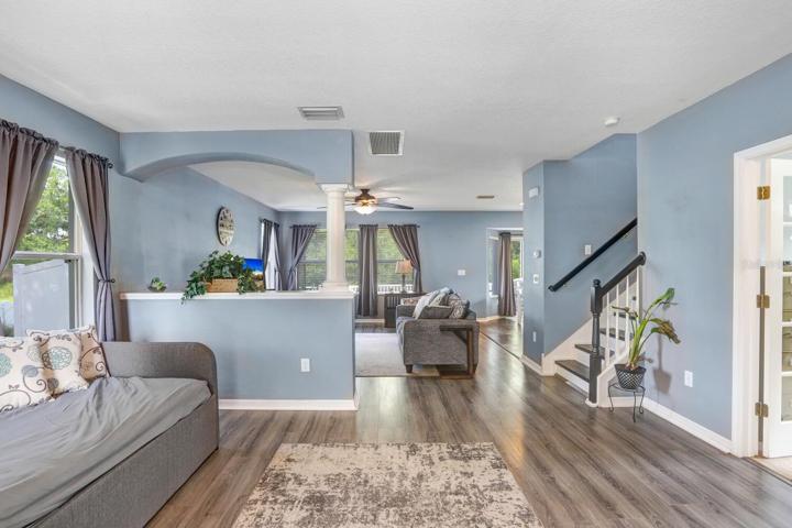 Upon entering is a spacious living area