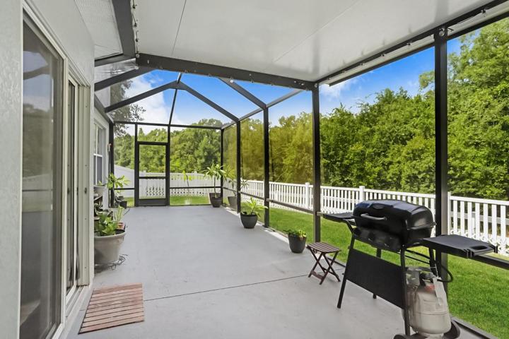 The extended & fully enclosed lanai provides privacy and beautiful conservation views.