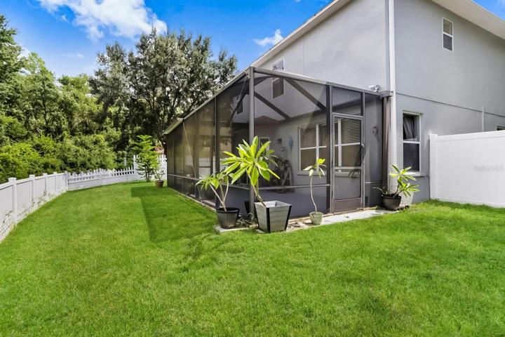 The extended & fully enclosed lanai provides privacy and beautiful conservation views.