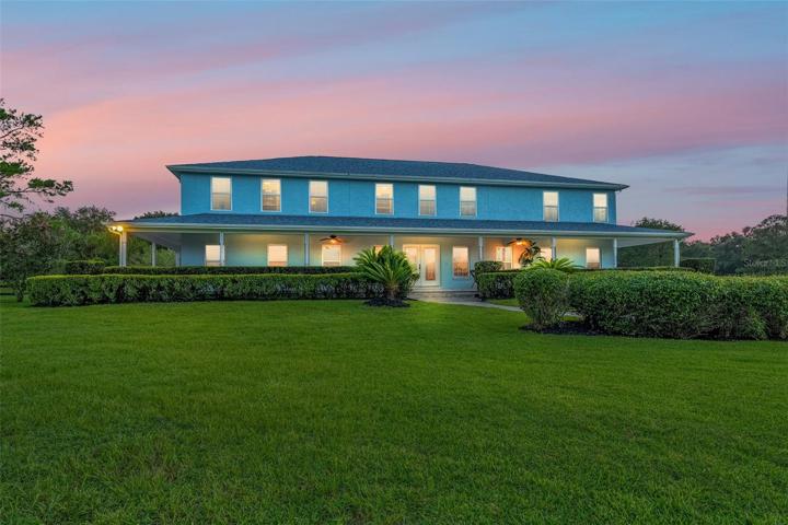 Grand estate with immaculate landscaping.