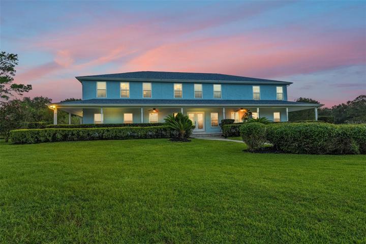 Grand estate with immaculate landscaping.