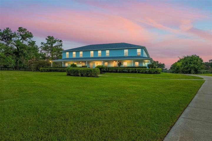 Grand estate with immaculate landscaping.
