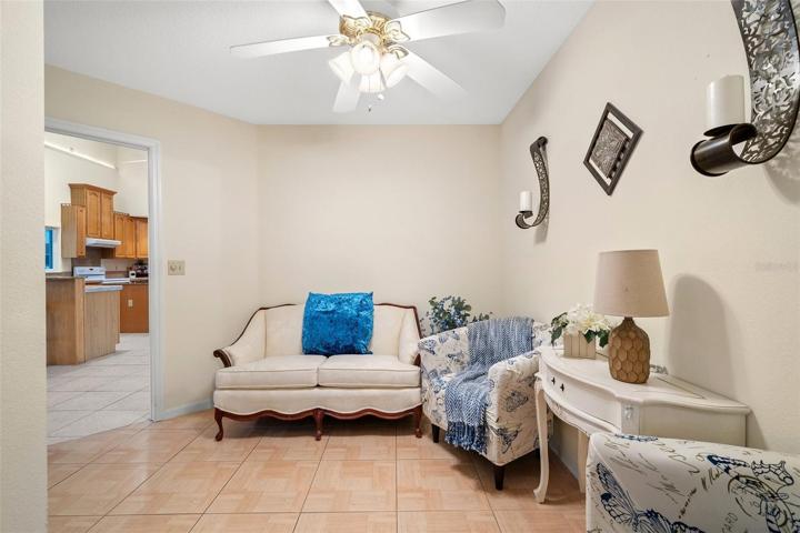 This room serves as a lower-level owner's suite, complete with a spacious sitting room, an expansive bedroom, and a luxurious full bathroom for exclusive use.