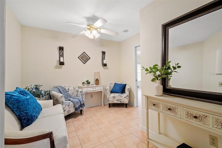 This room serves as a lower-level owner's suite, complete with a spacious sitting room, an expansive bedroom, and a luxurious full bathroom for exclusive use.