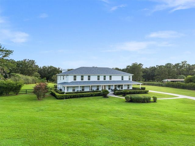 Grand estate with immaculate landscaping.