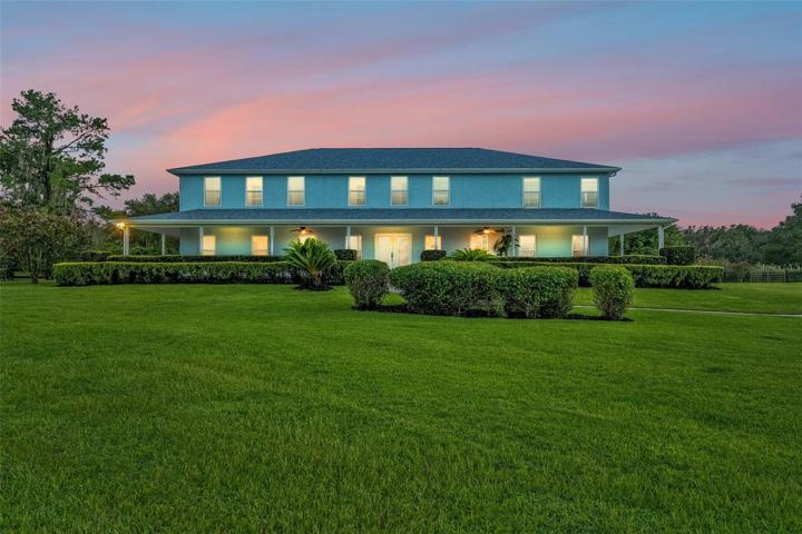 Grand estate with immaculate landscaping.