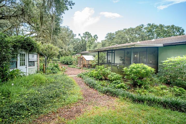 Second cottage and primary residence screened porch