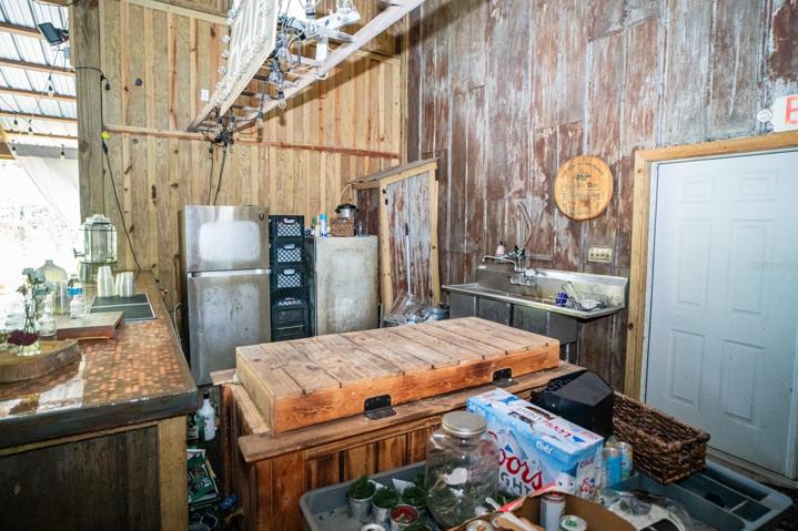Bar with sink and fridge
