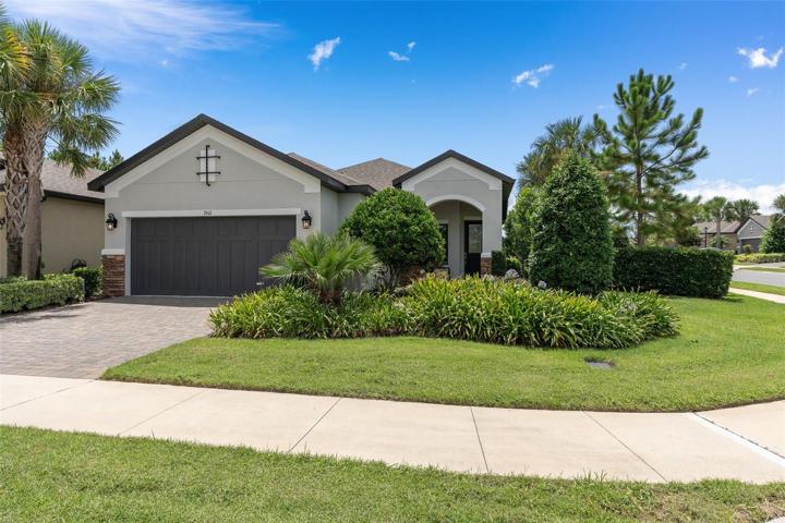 Front View with great curb appeal and the mature landscaping offers privacy.