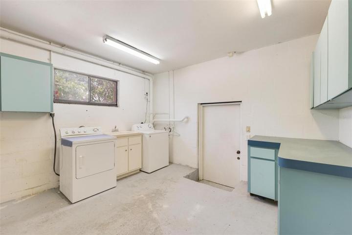 laundry area in attached garage