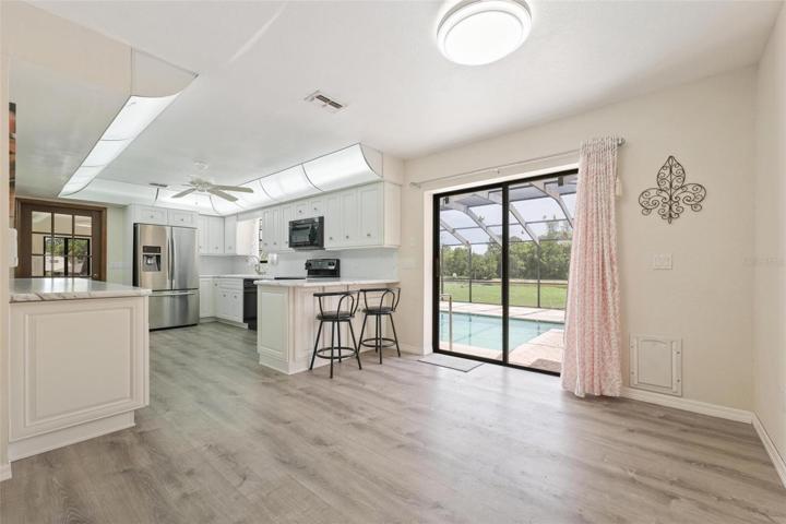 10.6x11 eat -in kitchen area.