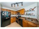 Granite Counter Tops, Solid Wood Cabinets & Matching Appliances