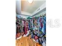 WALK-IN CLOSET is MASSIVE with Added Convenience of a Stackable Washer Dryer Inside