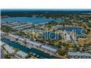 BEST LOCATION! You get the Beauty, Peace of WATERFRONT LIVING- 8 min away Experience the Lively Bars, Restaurants, Ray's and Rowdies Games, Museums, Galleries & Shopping DOWNTOWN- 20 min away from Award Winning GULF BEACHES=Warm Water, Powdery Sand, Excursions, Shopping, Bars & Restaurants- each Beach Town w/ it's Own Specialty