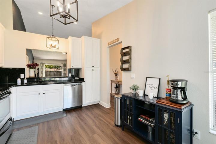 Spacious kitchen with new light fixtures, stainless appliances and plenty of storage space!