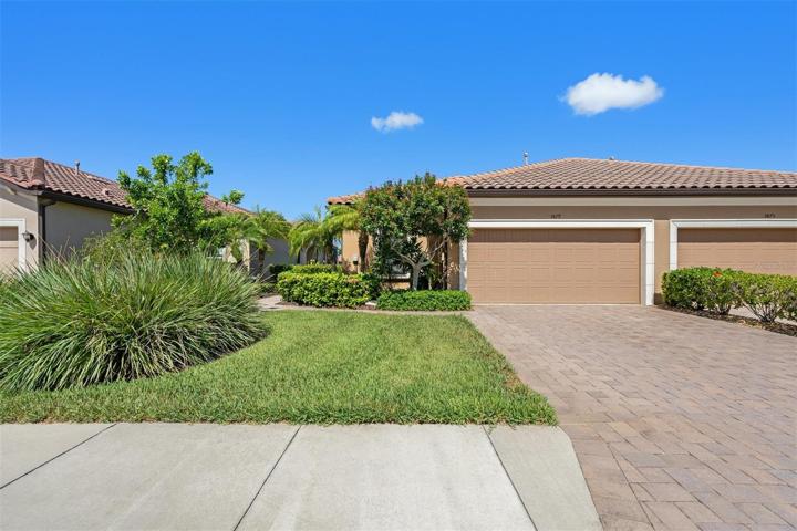 Front view showing paver driveway