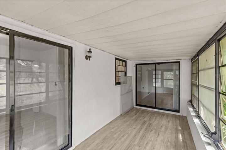 Large enclosed back porch