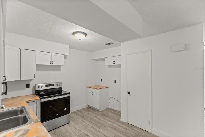Kitchen- Refrigerator to be installed prior to closing
