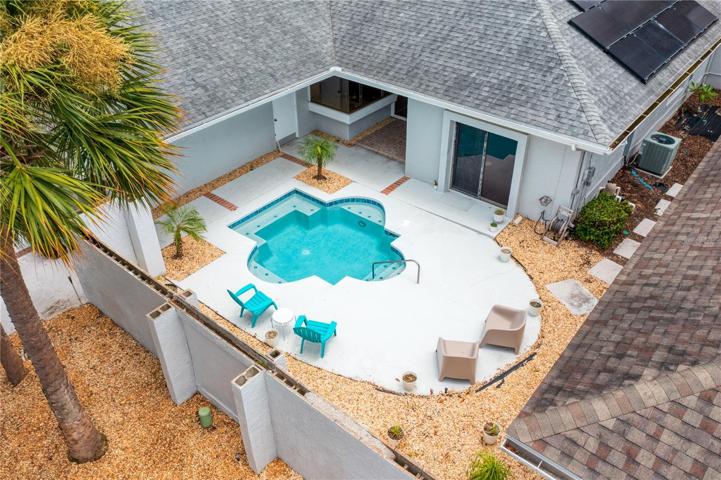 Through the courtyard doors, enjoy the privacy of your plunge pool and interior courtyard