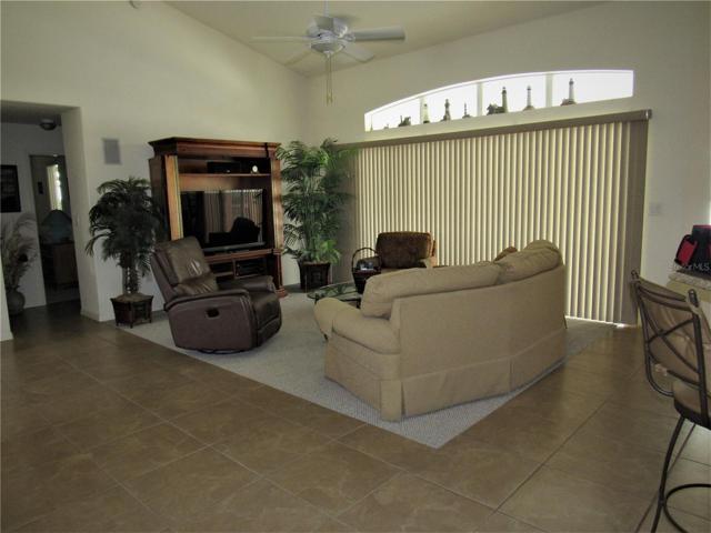 LIVING ROOM, SLIDERS TO THE POOL