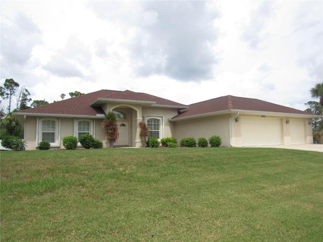 FRONT W/ 3 CAR GARAGE