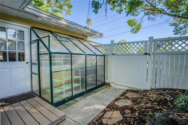 Your greenhouse is just off the kitchen at the rear of the home