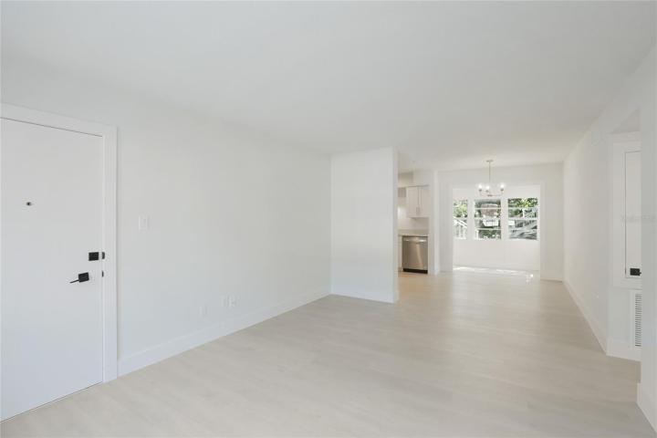 The entire unit has been professionally painted, radiating a fresh and inviting ambiance.