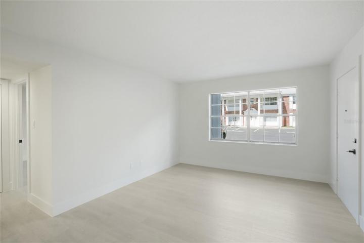 The renovation boasts brand new molding and doors, adding a touch of elegance to the space.