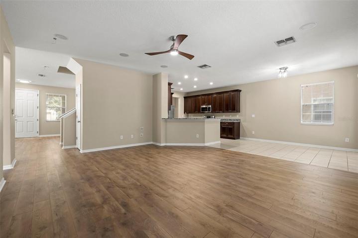 FAMILY ROOM with Breakfast-Bar, BREAKFAST-NOOK, and French Doors to Pool and Extended Lanai