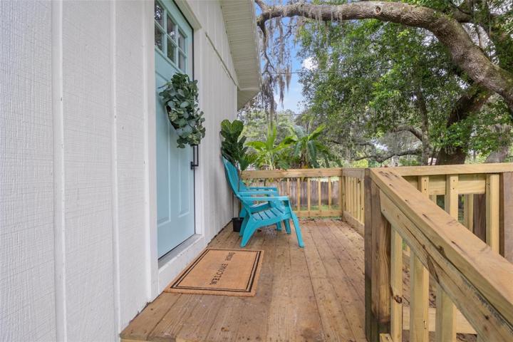 You'll be warmly welcomed by a charming wooden deck