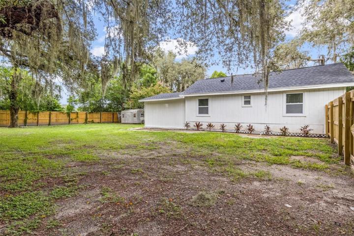 The expansive lot provides ample space to park your Boats, RVs, or Work Vehicles