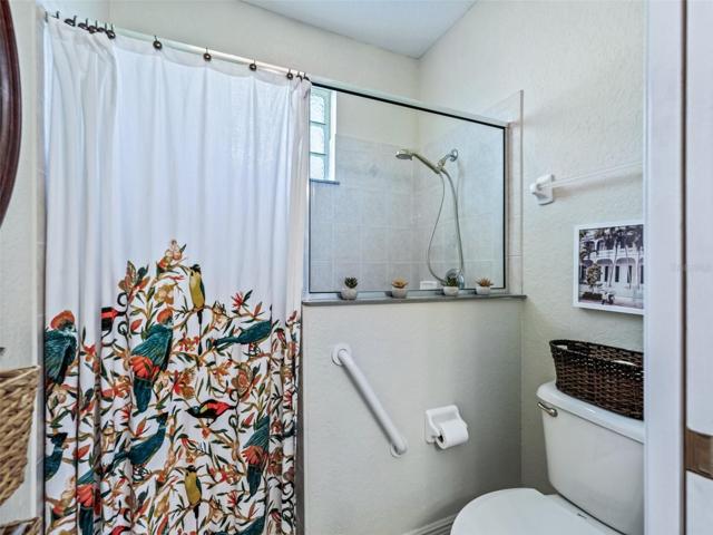 Bath has a large shower