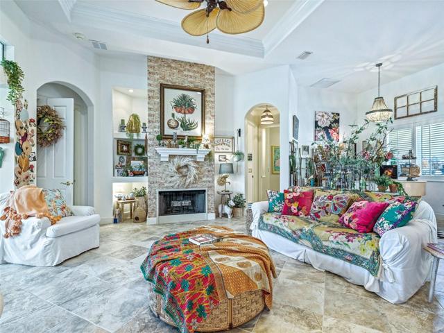 Great room has lighted niche for your colletions