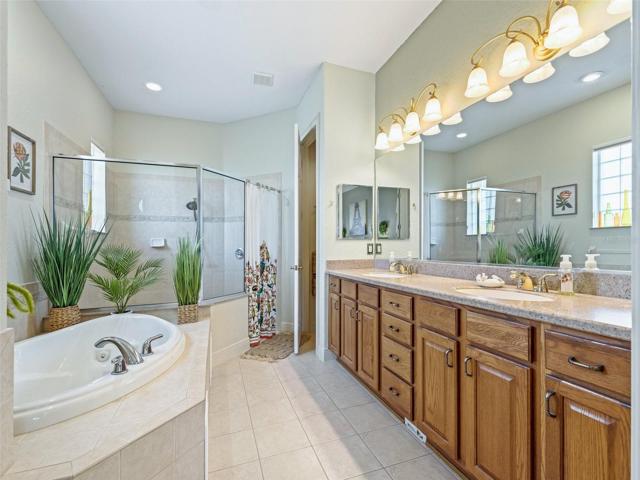 Primary bedroom's bath with double sinks, Tub and shower