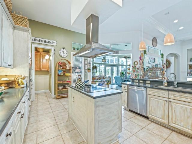 Kitchen features include cooktop ventilation