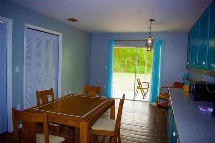 Kitchen showing backyard