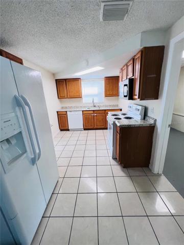 Kitchen view from dining agrea