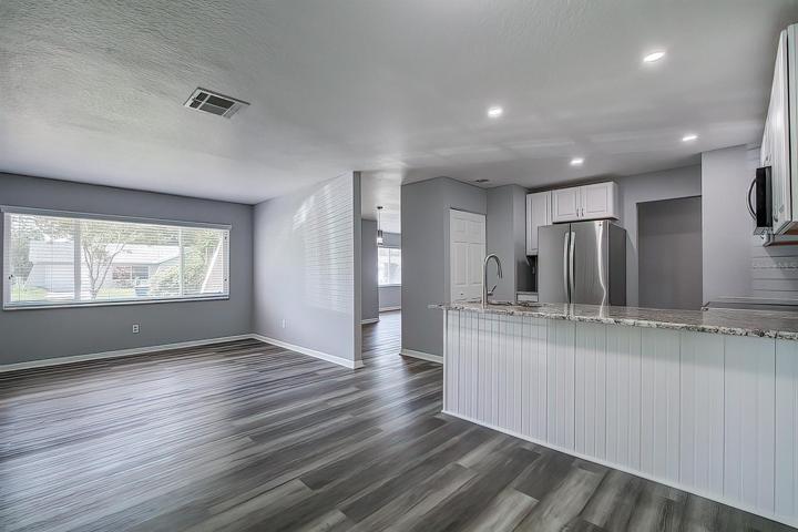 family room with view of kitchen