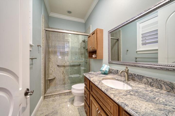 Ensuite guest bathroom on main living level.