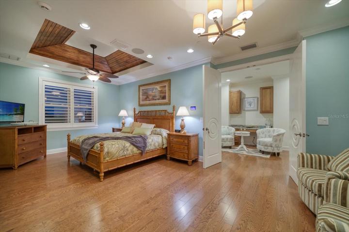 Primary  bedroom has  sitting area in addition to the adjacent office with morning bar.