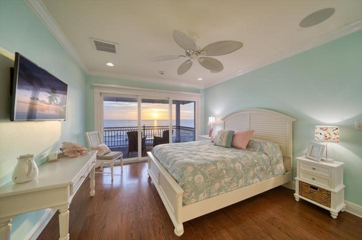 The top floor of the residence, this lovely bedroom has its own ensuite bath and private balcony to enjoy another beautiful sunset!
