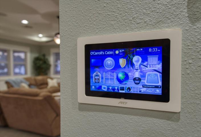 Control your home with a push of a button! Smart home technology is available to  control everything from the security system, blinds, music and more from either an easy to use control center or from your smart device anywhere in the world!