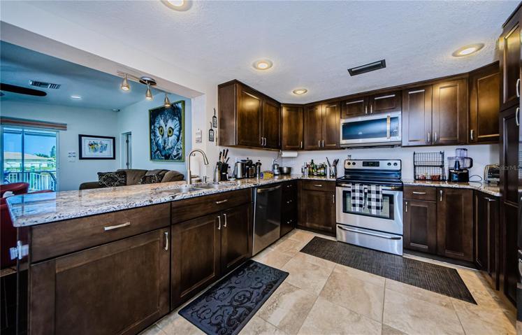 kitchen open to the family room with views of the water
